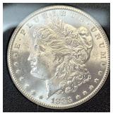 1883-CC Morgan silver dollar, uncirculated, in