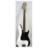 Squier by Fender electric bass guitar
