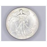 1986 American Silver Eagle silver bullion dollar,