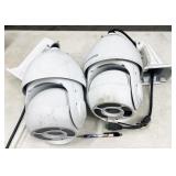 2pc Dedicated Micros security cameras in metal hou