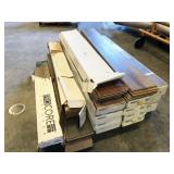 pallet of assorted flooring, mostly Pergo, open