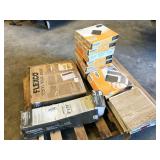 pallet of assorted vinyl flooring, mostly
