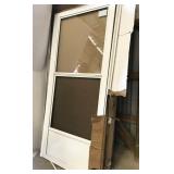 Larson metal storm door, 33"w x 79"t, special