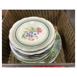 assorted porcelain decorative plates and saucers