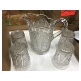 pressed glass pitcher and 4 glasses