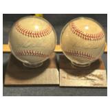 2 autographed baseballs