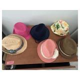 Ladies hats appear to be 7ish's