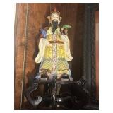 Asian Ceramic figure on a stand