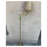 Brass colored floor lamp