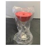 Martini glass with candle