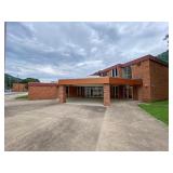 5.3 Acre Former School Campus on the River with Endless Redevelopment Potential
