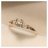 14K Diamond Engagement Ring Approx .06Ct & 2 sm.