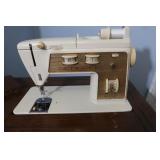 Singer Sewing Machine and Cabinet 18Wx36Lx30H W/