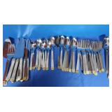 International Flatware Set w/Gold Accents