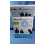 NIB Waterpik Ultra Plus/Nav. Plus Combo
