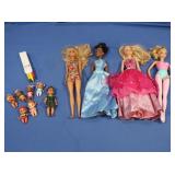 4 Barbie Dolls (like new)
