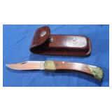 Schrade Knife in UNC Leathery Schrade ase