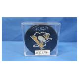 Joseph Autographed Puck in Case