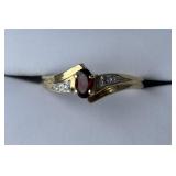 10K Garnet Ring w/2 Diamonds   1.9gr  Sz 7