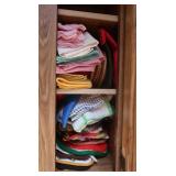 Cabinet Contents-Cloth napkins, Hot pads, Pot