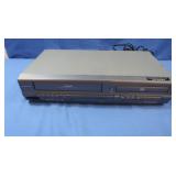 Magnavox VCR/DVD Player-turns on
