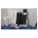 Rolls of Various cut aways for sewing