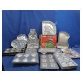 Large Lot of Cake & Cupcake Molds includes Looney