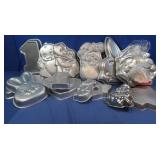 12 Asst. Cake Molds includes Superman