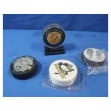 4 NHL Penguins Hockey Pucks,1 signed