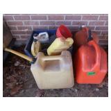 2 - 5 gal Plastic Gas Cans, 1 - 5gal Diesel Can,