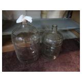 2 Lg Glass Jugs