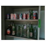 Two Shelves of Coke&Pepsi Collectible