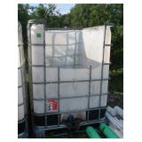 250 gal. Tote Tank w/Metal Cage(front cut open)