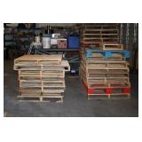 Stack of approximately 17 wood pallets