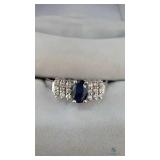 White Gold Ring with Sapphire Center & 18 Surround