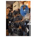 Wall of approximately 100 video cables