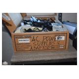 One Box of A/C power adapters; supplies