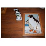 Penguin statue and tile