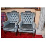 2 blue and white high backed chairs