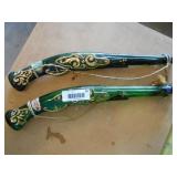 Glass bottle in shape of muskets