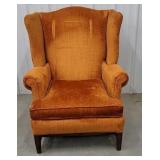 Orange wingback chair. ** project