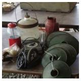 Industrial lamp shades, oil bottle, sad iron,