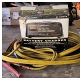 Battery charger and jumper cables.