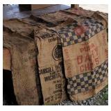 Box lot of advertising feed sacks.