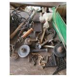Gree tote with contents, railroad spikes, shelf