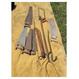 Hay fork, wrecking bars, saws, etc