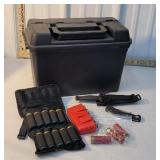 25 12ga slugs, 3 bird shot, 2 knives, plastic