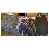 Lot of dresses and skirts mostly size 10/12/14