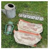Watering can, lantern, mail bags