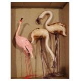 3 flamingos